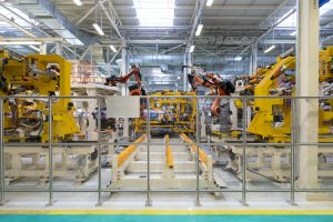 process of welding cars. Modern Assembly of cars at plant. automated build process of car body